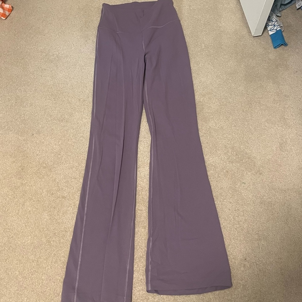 Lululemon size 4/6 light purple flare leggings NEVER WORN